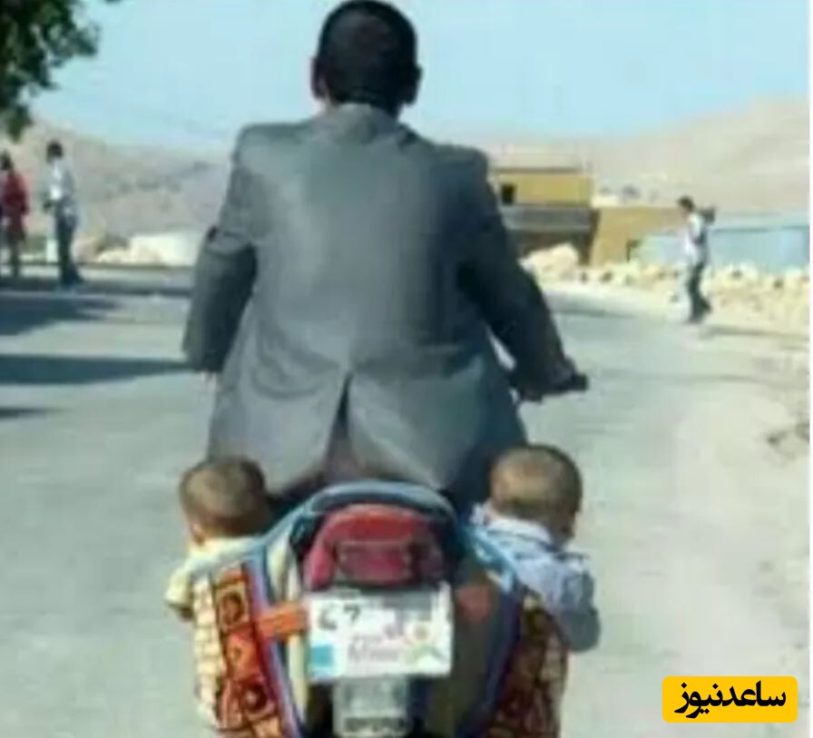 خلاقیت هوشمندانه یک پدر باهوش برای حمل 2 قلوهایش با موتور در خیابان حماسه ساز شد+عکس/ مغز نگو معدن طلا بگو 7 حمل دو قلو